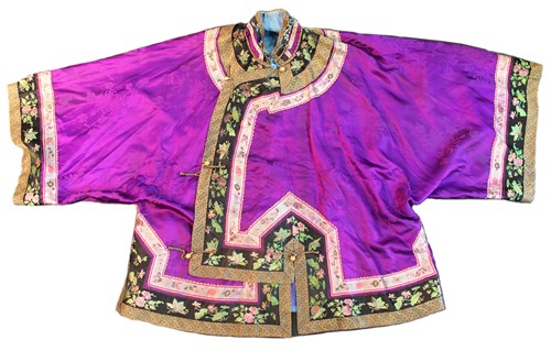 Lot 122 - A Chinese woman's silk and embroidered jacket, late Qing Dynasty