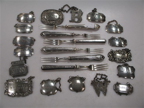Lot 236 - A set of four silver decanter labels together...
