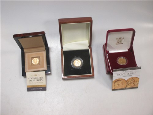 Lot 194 - An Edward VII gold sovereign another 1927 and...