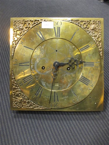Lot 180 - A brass longcase clock face