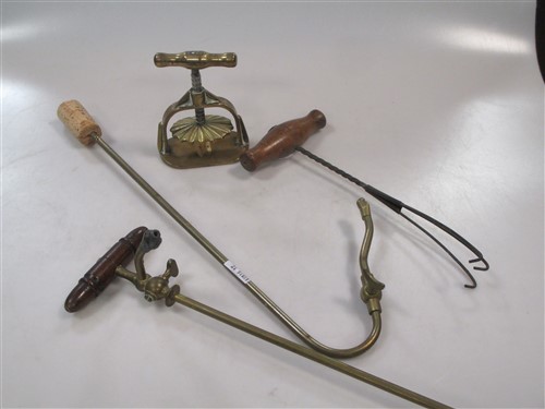 Lot 132 - Two 19th century drink dispenser taps, a brass...