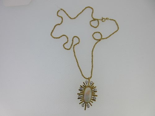 Lot 41 - An opal, diamond and 18ct gold pendant and chain