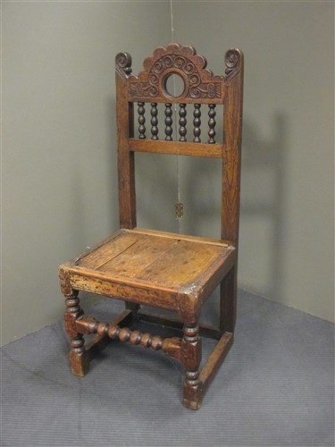 Lot 405 - A 17th century and later oak chair