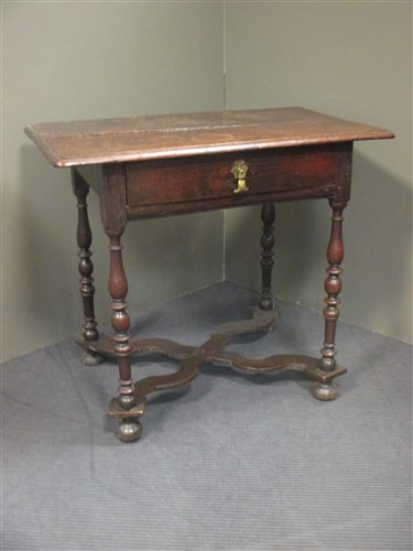 Lot 406 - A late 17th century oak side table with single...