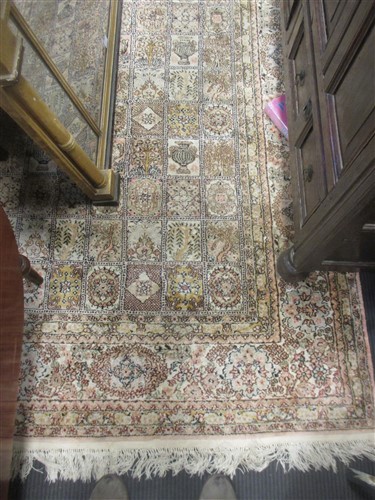 Lot 478 - A large pink ground silk rug 243 x 183cm