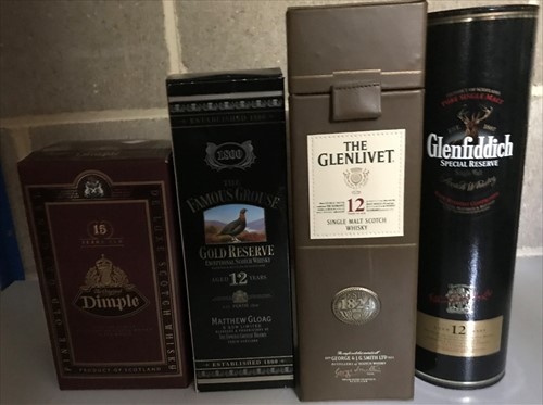 Lot 914 - Four bottles of Scotch Whisky in boxes.