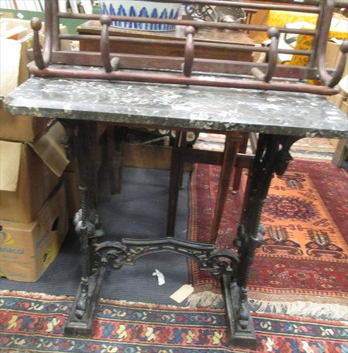 Lot 547 - A 19th century marble topped cast iron table,...