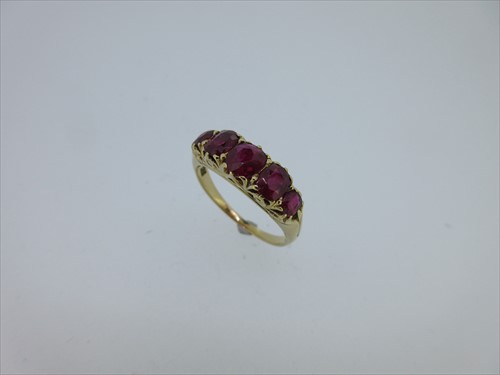 Lot 245 - A five stone ruby ring