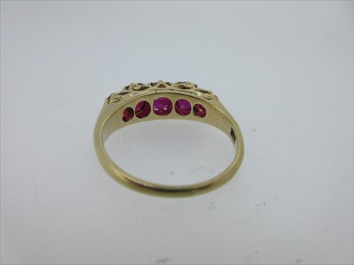 Lot 245 - A five stone ruby ring