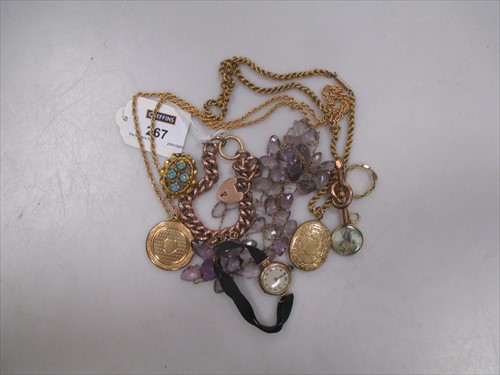 Lot 267 - A 9ct rope chain supporting a locket stamped '15'