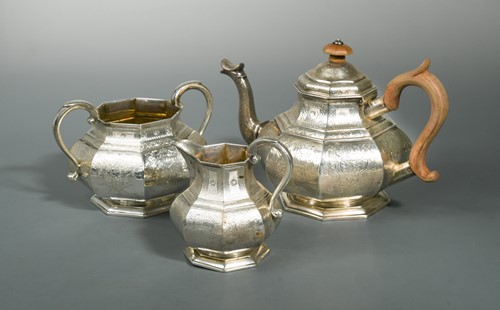 Lot 411 - A William IV silver three piece tea set