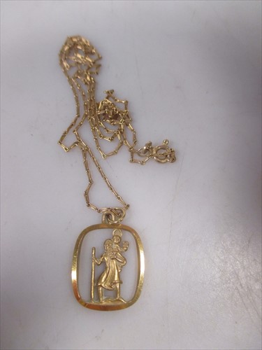 Lot 209 - A 9ct gold St Christopher pendant and chain