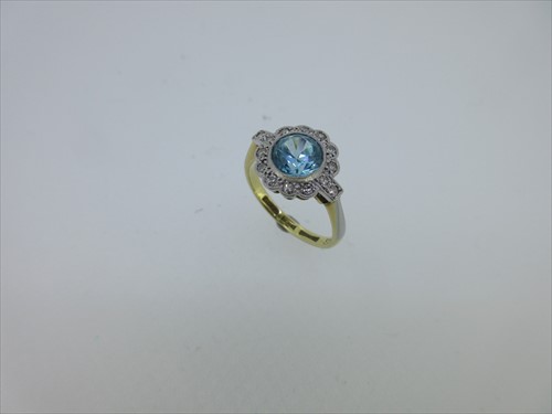 Lot 78 - A blue zircon and diamond cluster ring