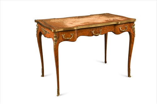 Lot 420 - A Louis XV style kingwood and parquetry bureau plat