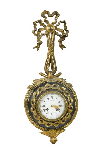 Lot 260 - A Louis XVI style 8 day gilt metal and bronzed cartel clock