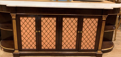 Lot 604 - A Regency style mahogany parcel gilt side...