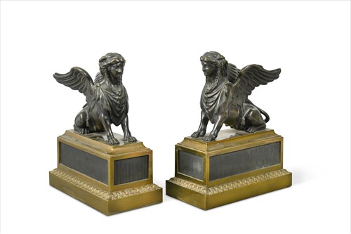 Lot 395 - A pair of bronze and gilt bronze chenets, early to mid 19th century