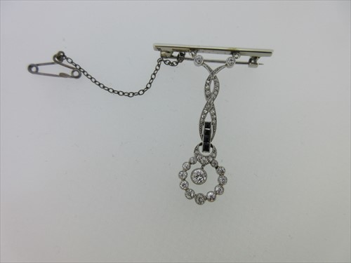 Lot 191 - A Belle Époque diamond and sapphire pendant now on a bar brooch