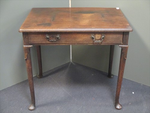 Lot 638 - A George II mahogany side table with lapit...