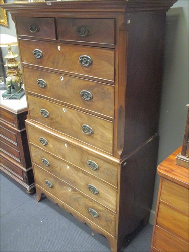 Lot 489 - A George III mahogany chest on chest, on...