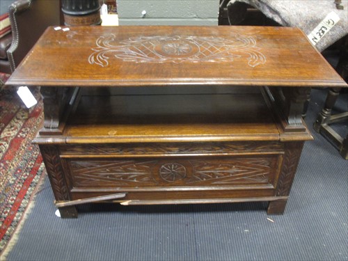 Lot 609 - An oak monks bench, 107cm wide
