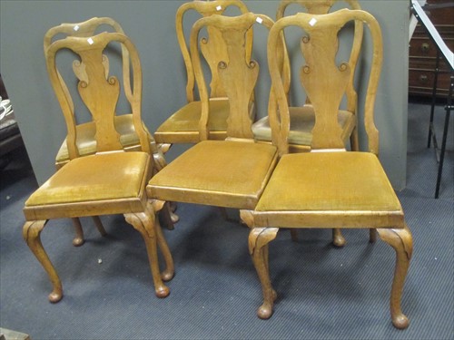 Lot 599 - A set of six George II faded mahogany dining...