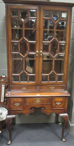 Lot 495 - A George III oak lowboy together with an...