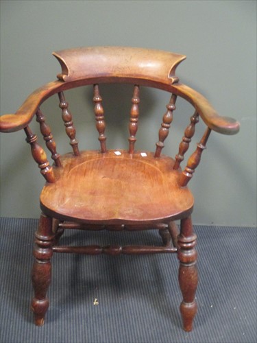 Lot 543 - A Victorian smoker's bow armchair