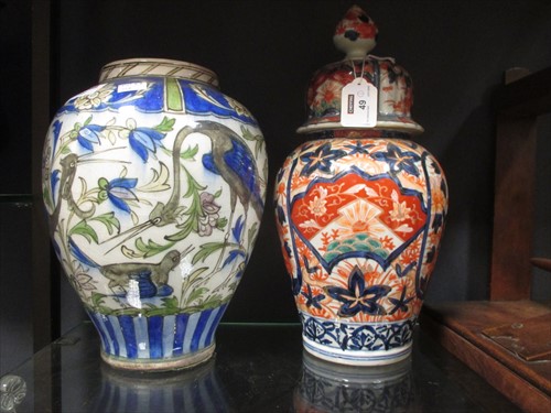 Lot 49 - A 20th century Persian vase (damaged) and an...