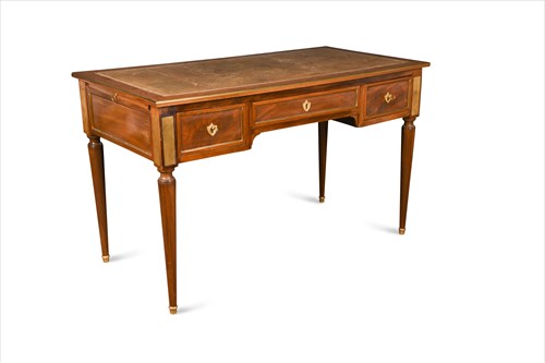 Lot 416 - A Louis XVI style mahogany bureau plat, mid 19th century