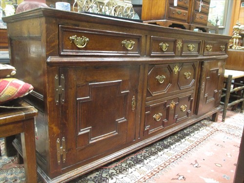 Lot 540 - An 18th century and later oak dresser base