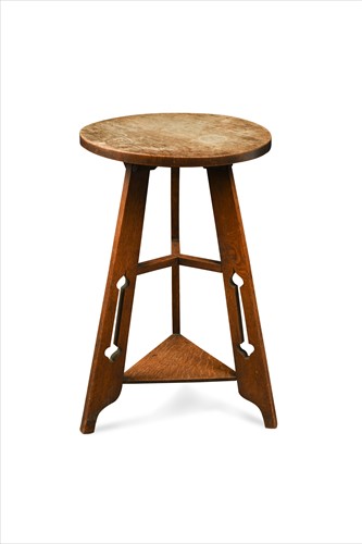 Lot 162 - An Arts & Crafts oak tripod occasional table