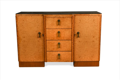 Lot 197 - An Art Deco break front maple sideboard