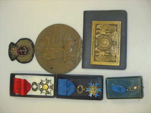 Lot 227 - A collection of medals and coins to include a...