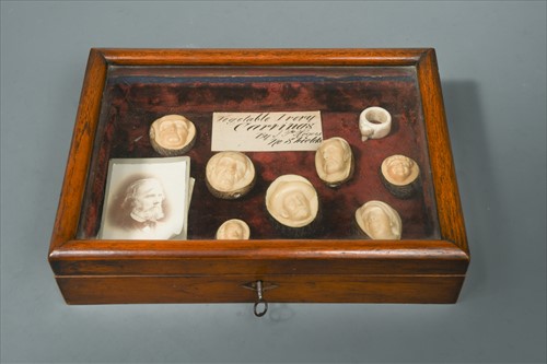 Lot 247 - A small collection of carved vegetable ivory portraits