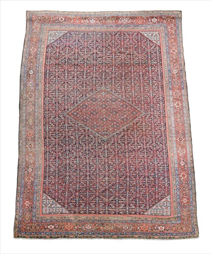 Lot 382 - A large Fereghan carpet