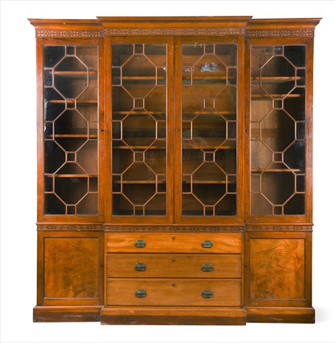 Lot 309 - A mahogany breakfront library bookcase, early 19th century