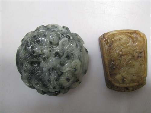 Lot 150 - Jade daigou, red lacquered snuff bottle, jade...