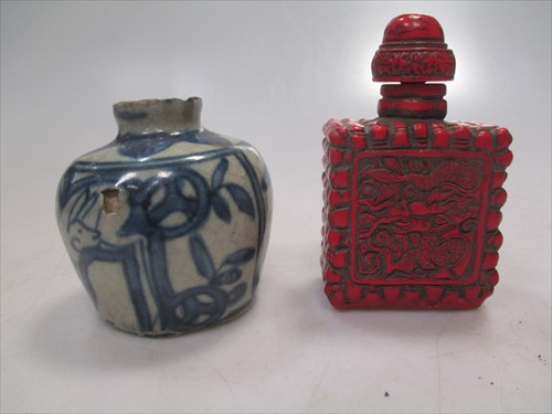 Lot 150 - Jade daigou, red lacquered snuff bottle, jade...
