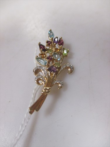 Lot 206 - A 9ct gold tutti frutti brooch