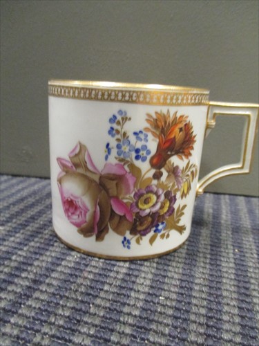 Lot 166 - A Meissen coffee cup with painted flowers and...