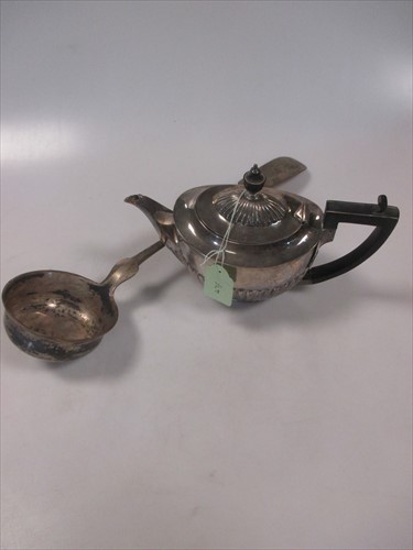 Lot 254 - A small silver teapot, a Continental silver...