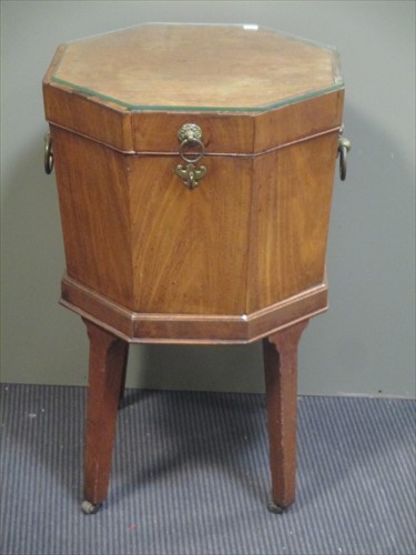 Lot 587 - A late George III mahogany octagonal...