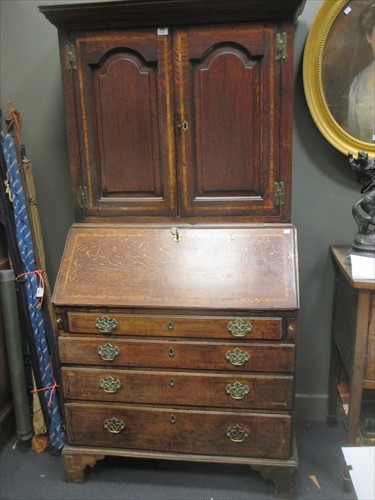 Lot 481 - An oak 18th century bureau cabinet, 192cm x 100cm