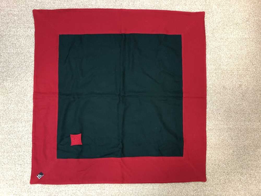 Lot 141 - A Hermes red and green wool scarf