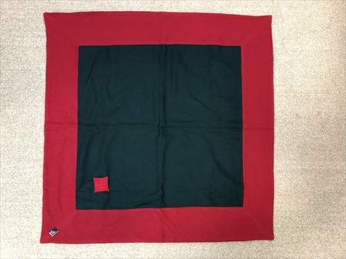Lot 141 - A Hermes red and green wool scarf