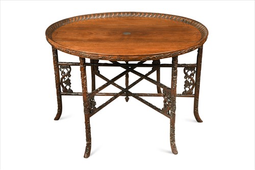 Lot 425 - A large Anglo-Chinese hardwood circular low table