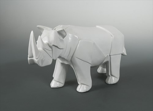 Lot 49 - In the manner of Akira Yoshizawa, a white glazed model of a rhino