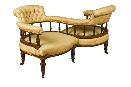 Lot 365 - A late Victorian walnut conversation seat