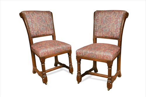 Lot 149 - A pair of Puginesque oak side chairs